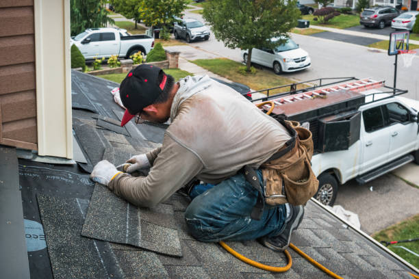 Professional Roofing technician working in Rye, NH